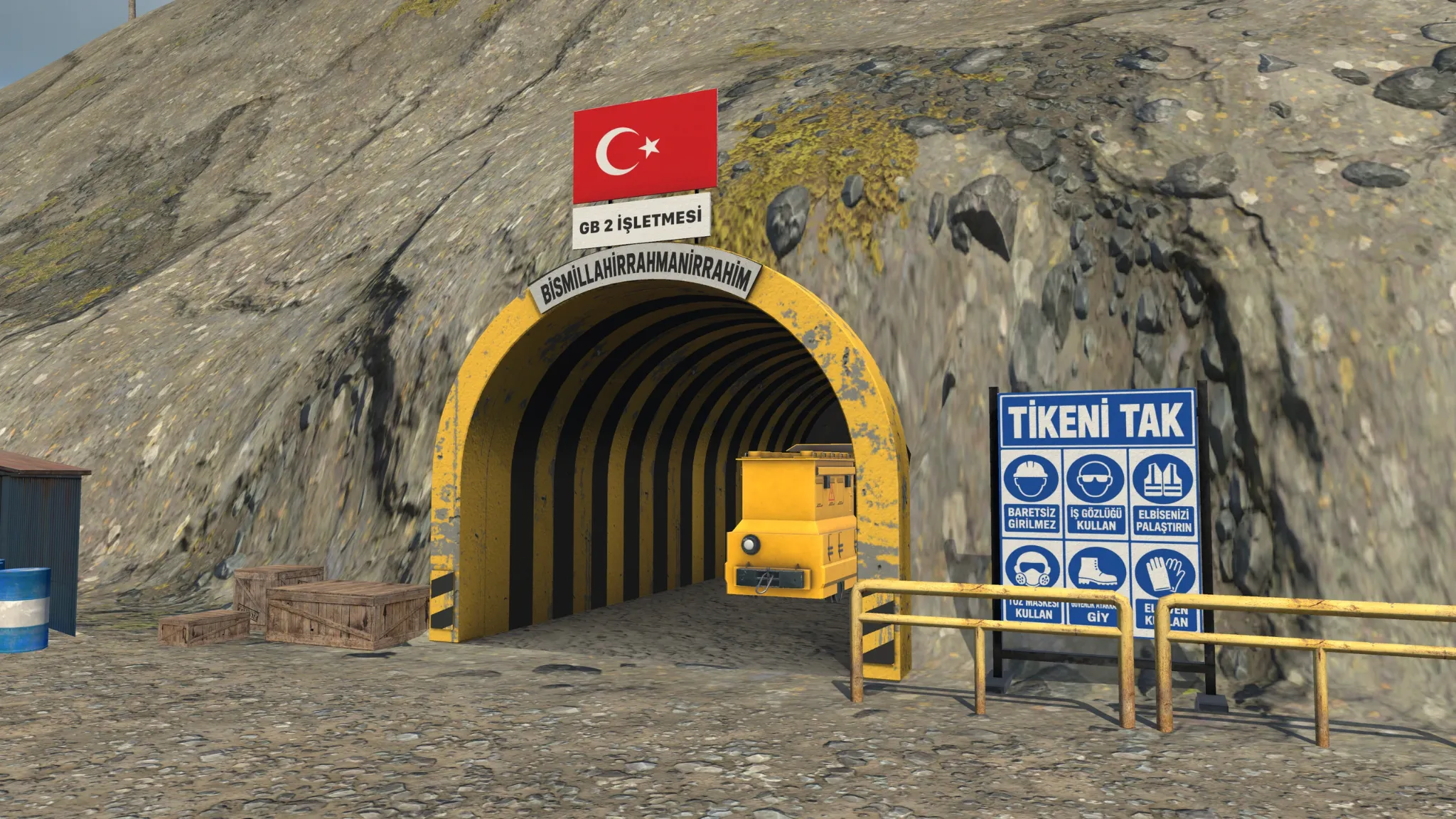 Yellow arched underground mine entrance with a vehicle inside, safety signs and rugged rock face